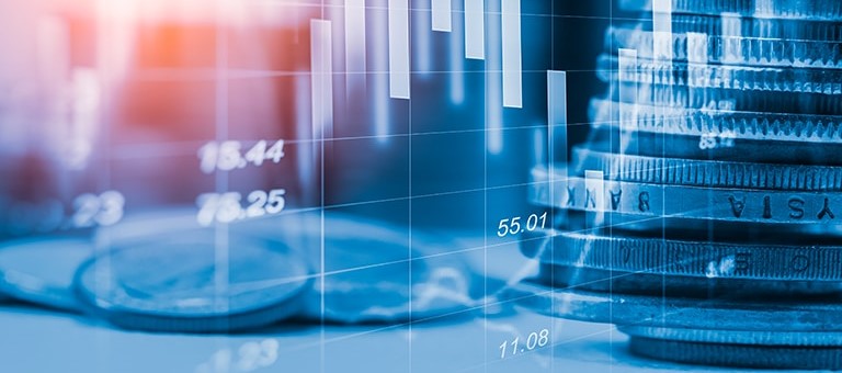 Financing image with Coins and overlapping Statistic Graph