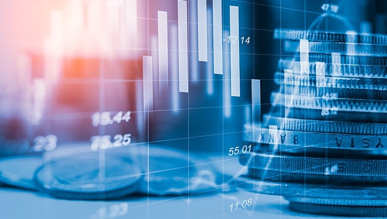 Financing image with Coins and overlapping Statistic Graph