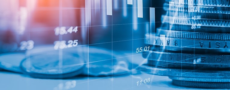 Financing image with Coins and overlapping Statistic Graph